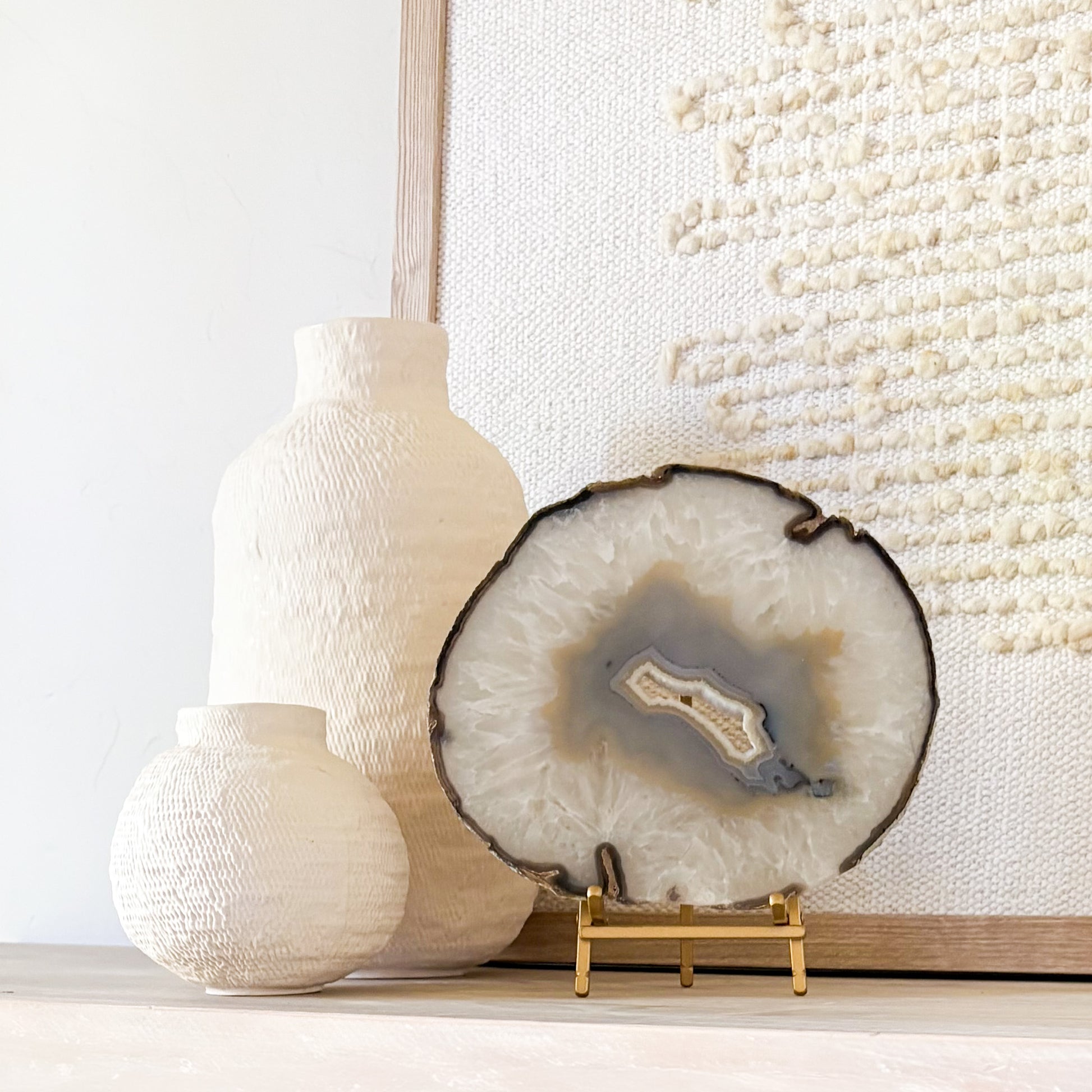 Polished agate slice from Brazil on stand modern luxury interior styling