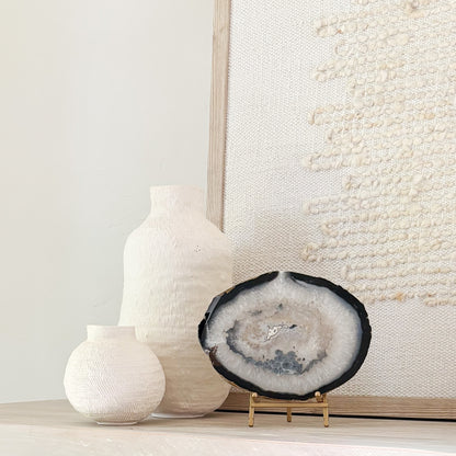 Brazilian agate slice on metal stand displaying natural crystal banding for luxury home decor