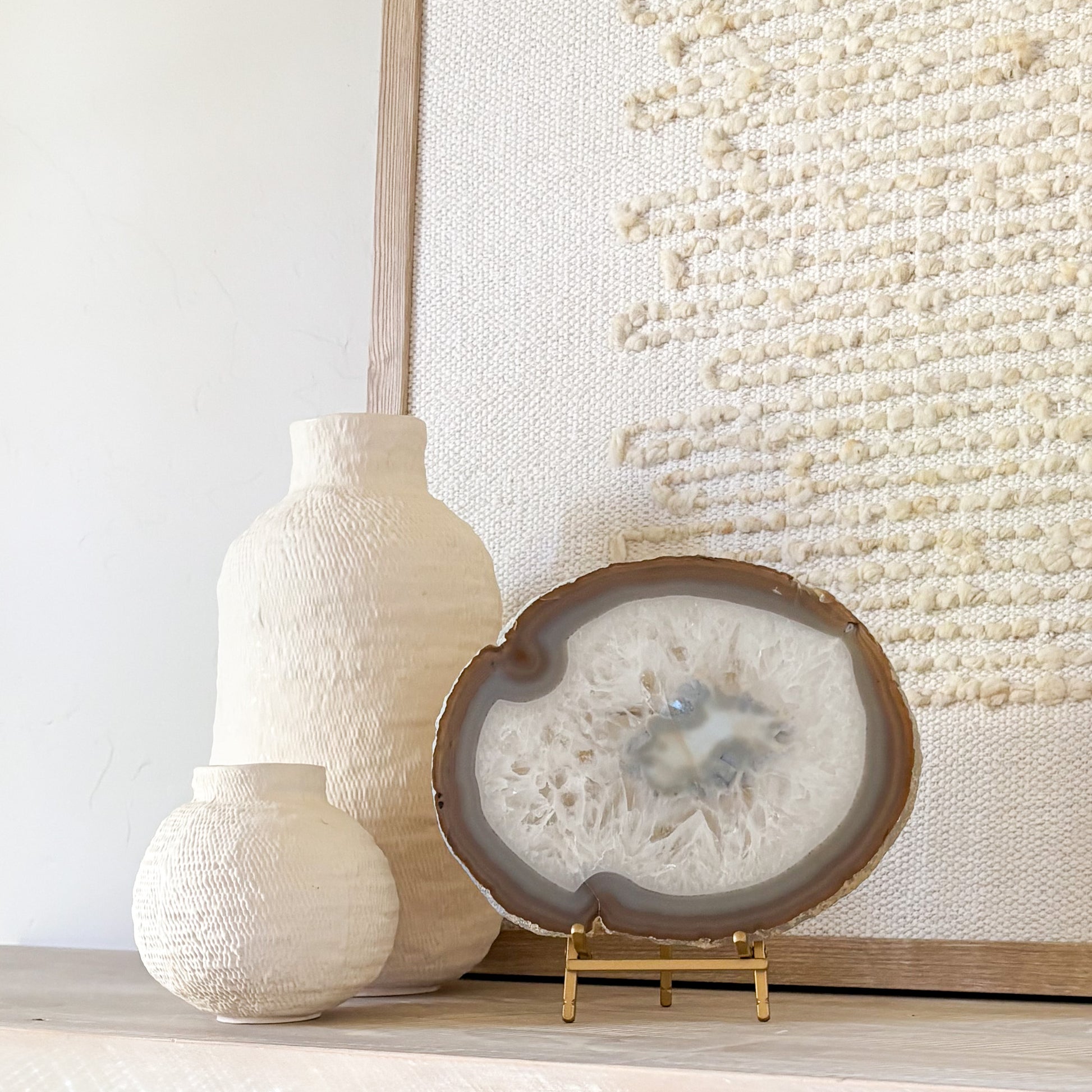 Brazilian agate display piece on stand for elegant shelf styling