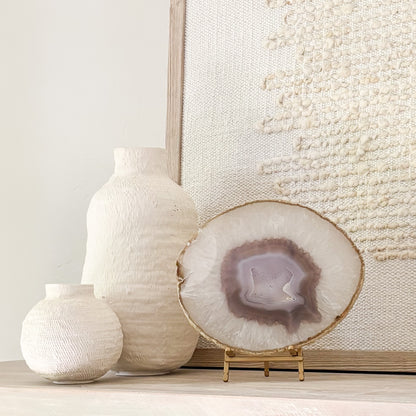 Natural Brazilian agate gemstone slice mounted on stand, perfect for luxury shelf and tabletop décor.