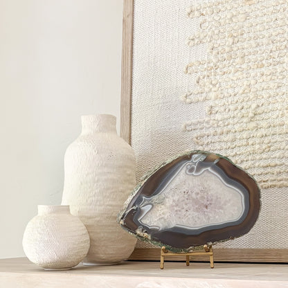 Premium Brazilian agate slice display piece on stand with vibrant crystal patterns and polished finish.