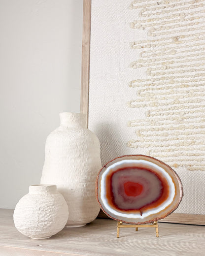Polished Brazilian agate crystal decor on stand with one-of-a-kind natural stone patterns.