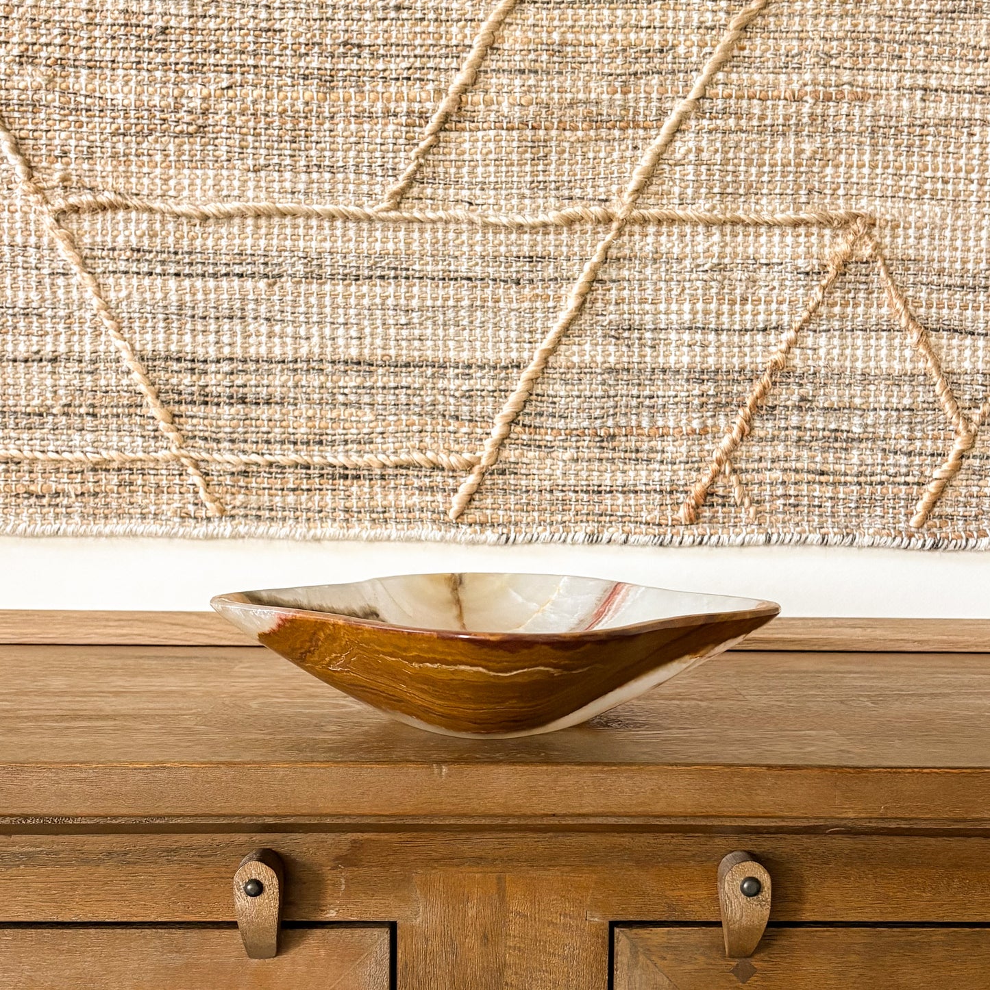 Elegant large brown onyx bowl hand carved from natural stone, ideal for luxury home decor or table centerpiece