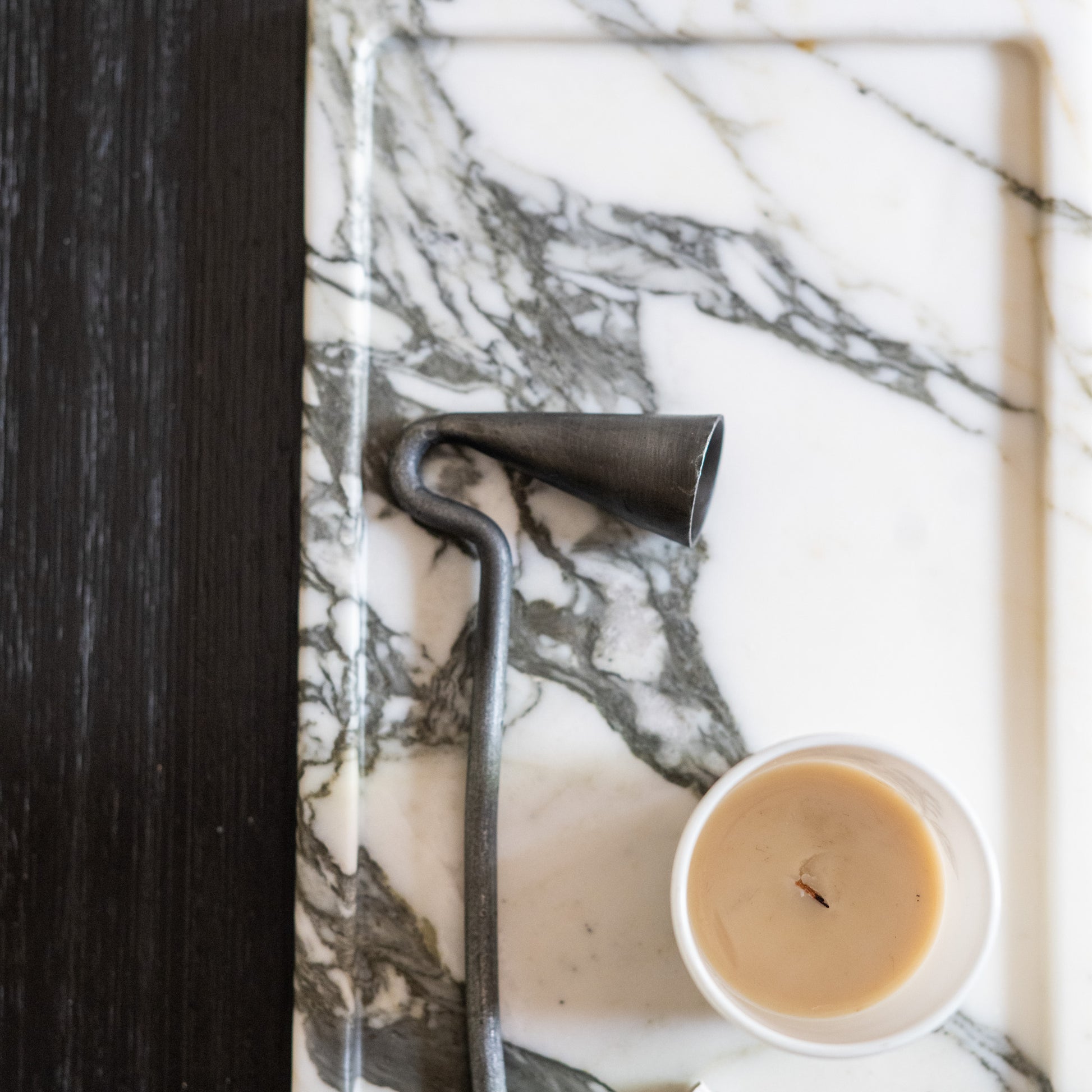 Modern Italian marble tray with candle and sculptural decor for contemporary interiors