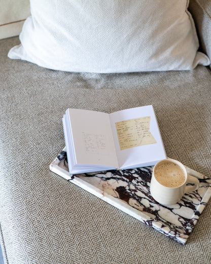 Elegant Calacatta Viola marble tray styled as a decorative accent for luxury interiors