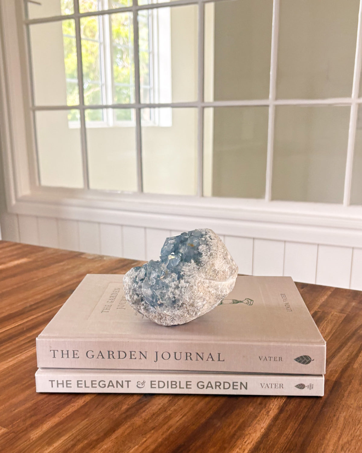 Natural celestite mineral cluster with soft blue crystal formation