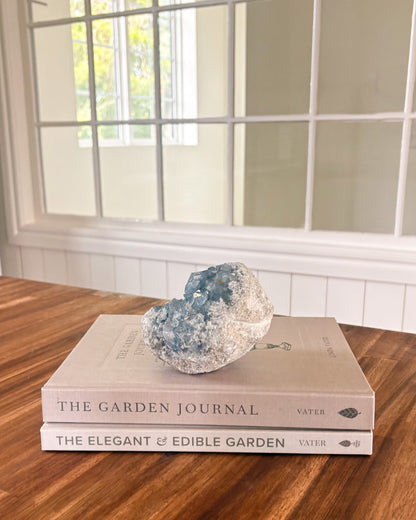 Natural celestite mineral cluster with soft blue crystal formation