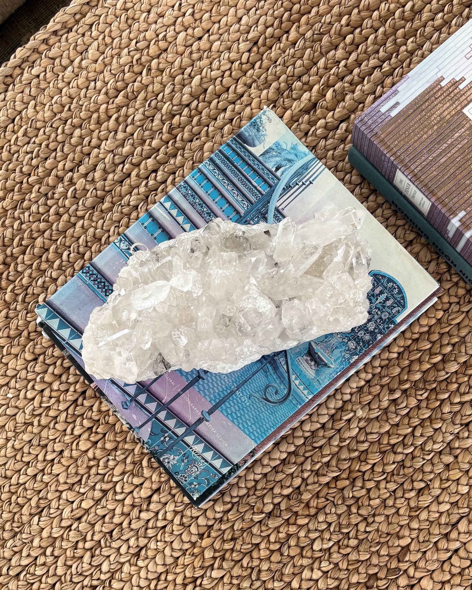Natural clear quartz crystal cluster with sparkling crystal points