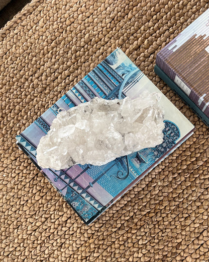 Natural clear quartz crystal cluster with sparkling crystal points