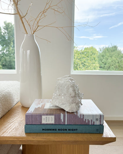 Large clear quartz crystal cluster displayed as luxury home decor