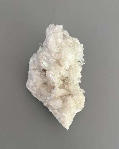 One-of-a-kind clear quartz cluster with intricate crystal formations and natural mineral texture.