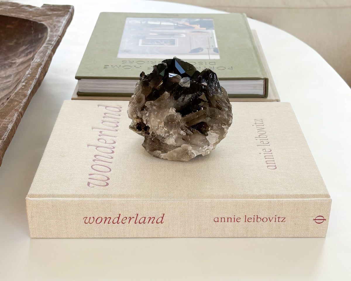 Raw smoky quartz crystal cluster with translucent brown quartz points