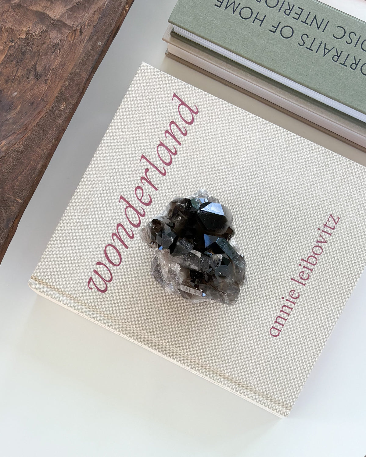 Sculptural smoky quartz crystal cluster with layered natural points