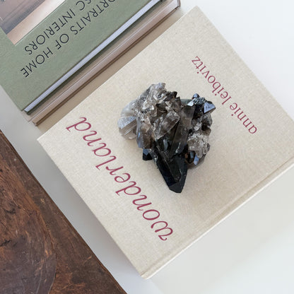 Natural smoky quartz crystal cluster with dark translucent crystal points