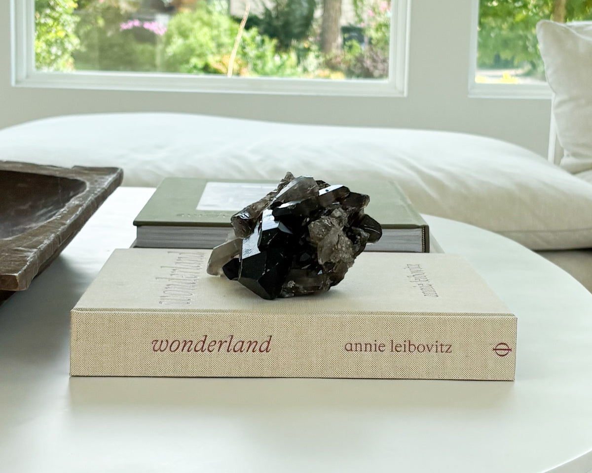 Sculptural smoky quartz crystal cluster with layered natural points