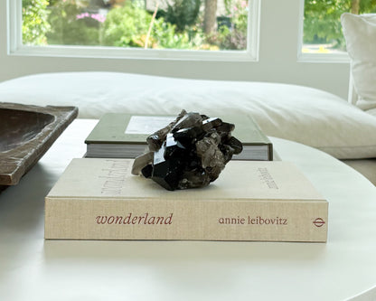 Sculptural smoky quartz crystal cluster with layered natural points