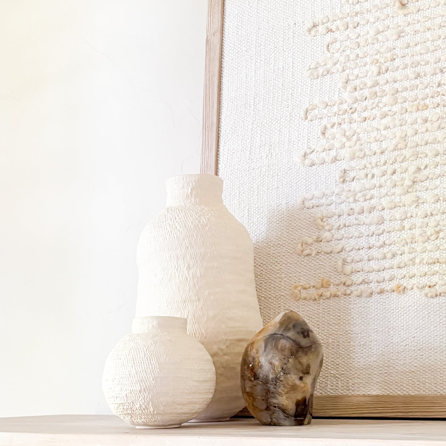 Natural stone sculpture decor featuring Madagascar fern agate in wabi-sabi interior styling