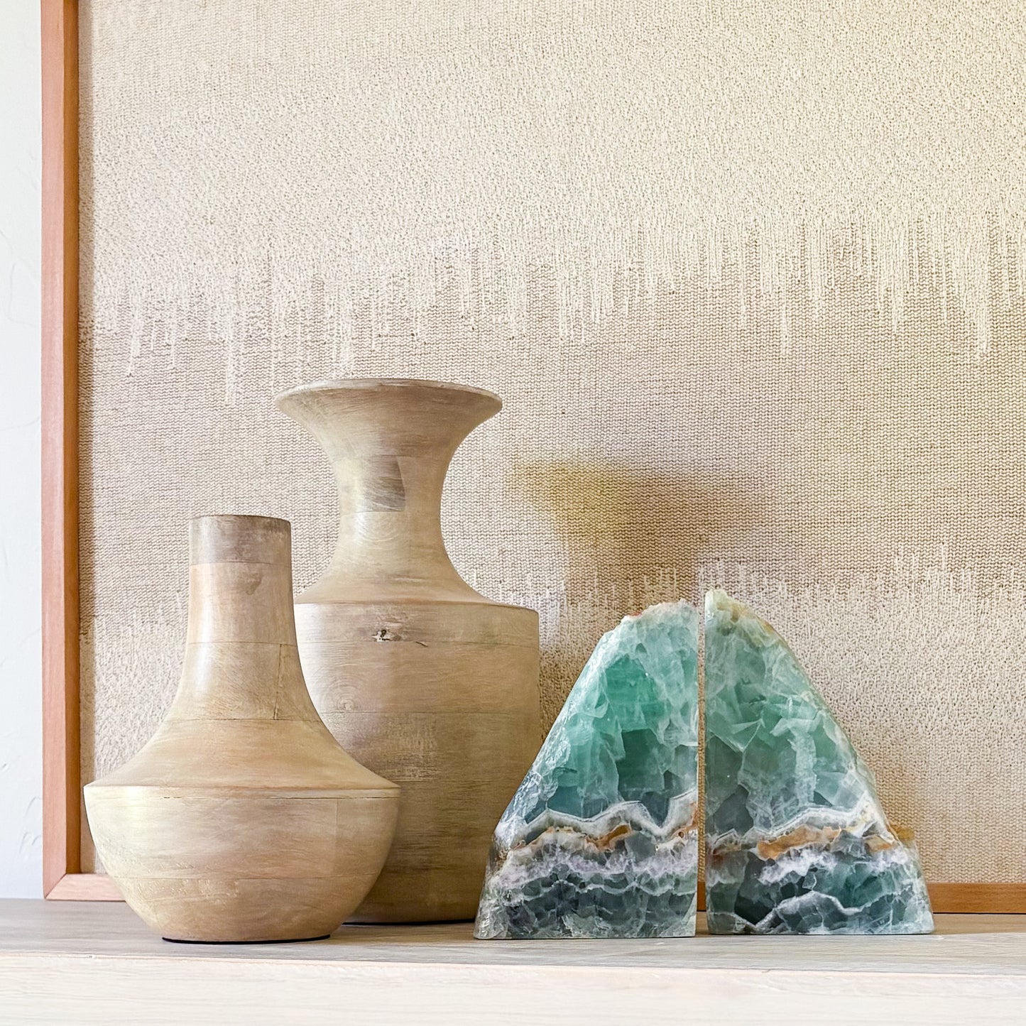 Fluorite crystal bookends pair with polished purple and green natural stone