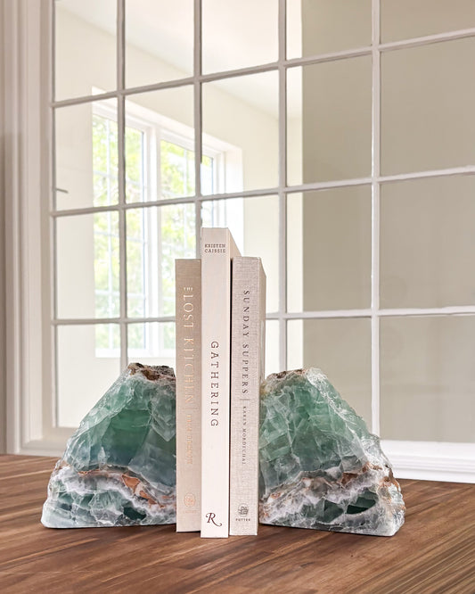 One-of-a-kind fluorite stone bookends with green and purple coloring