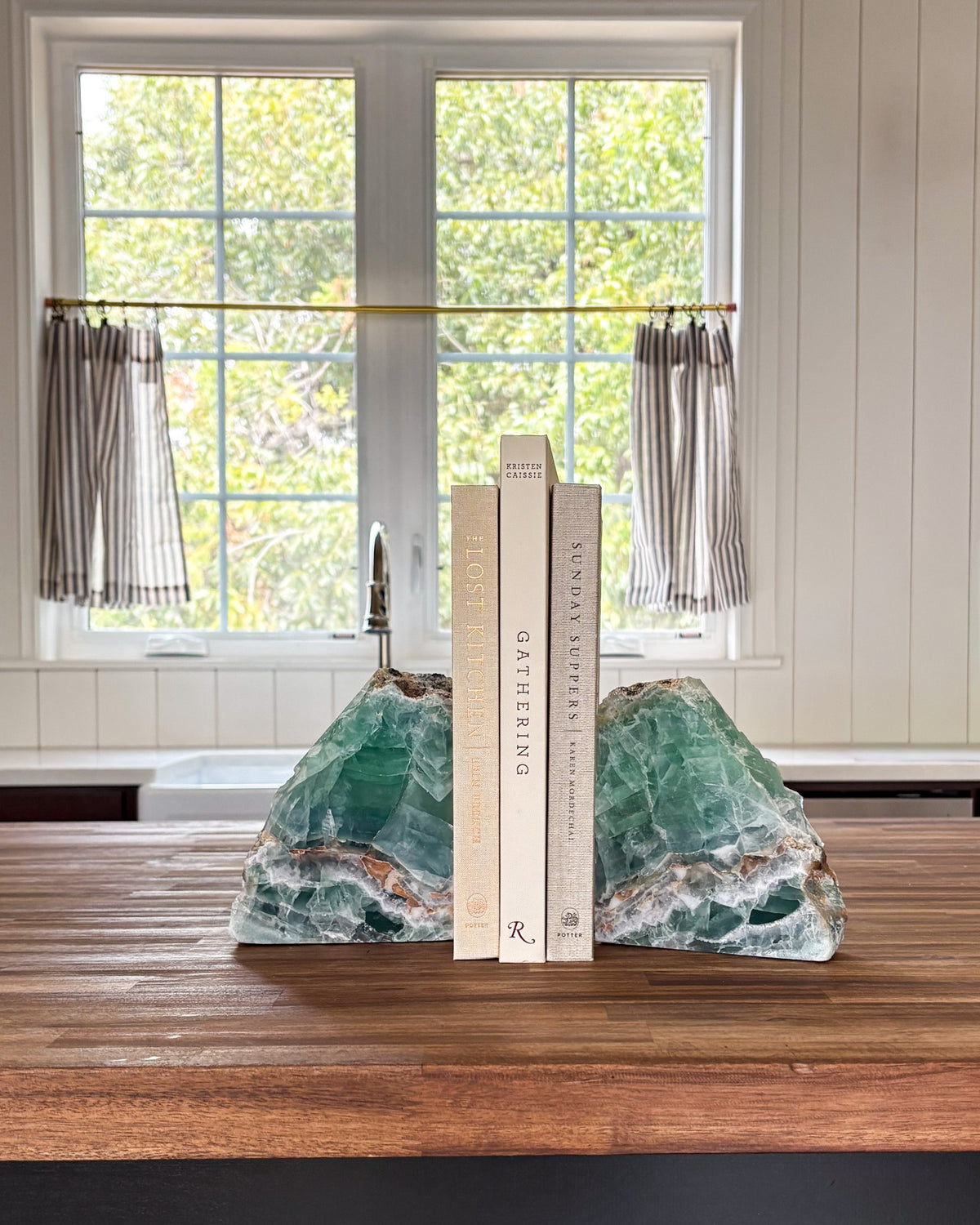 Natural fluorite bookend pair with green and purple mineral banding
