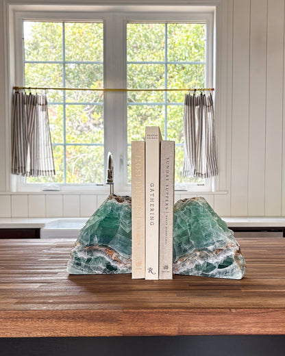 Natural fluorite bookend pair with green and purple mineral banding