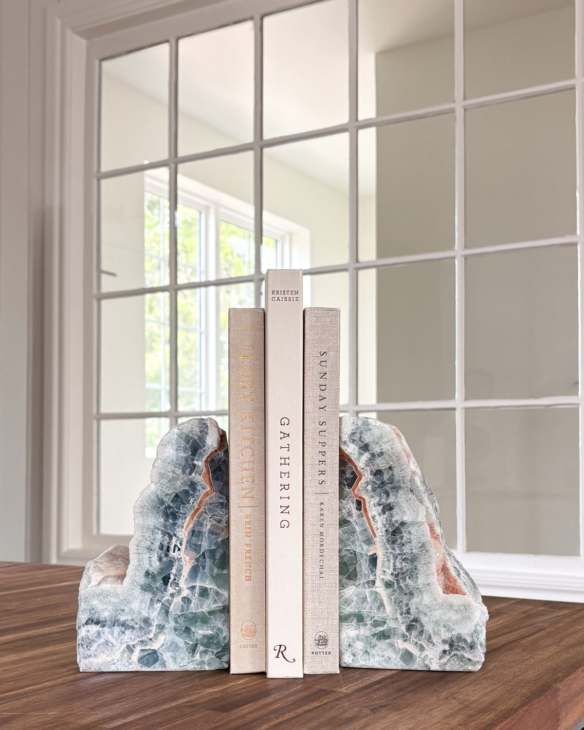 Natural fluorite bookends with translucent green and purple crystal detail