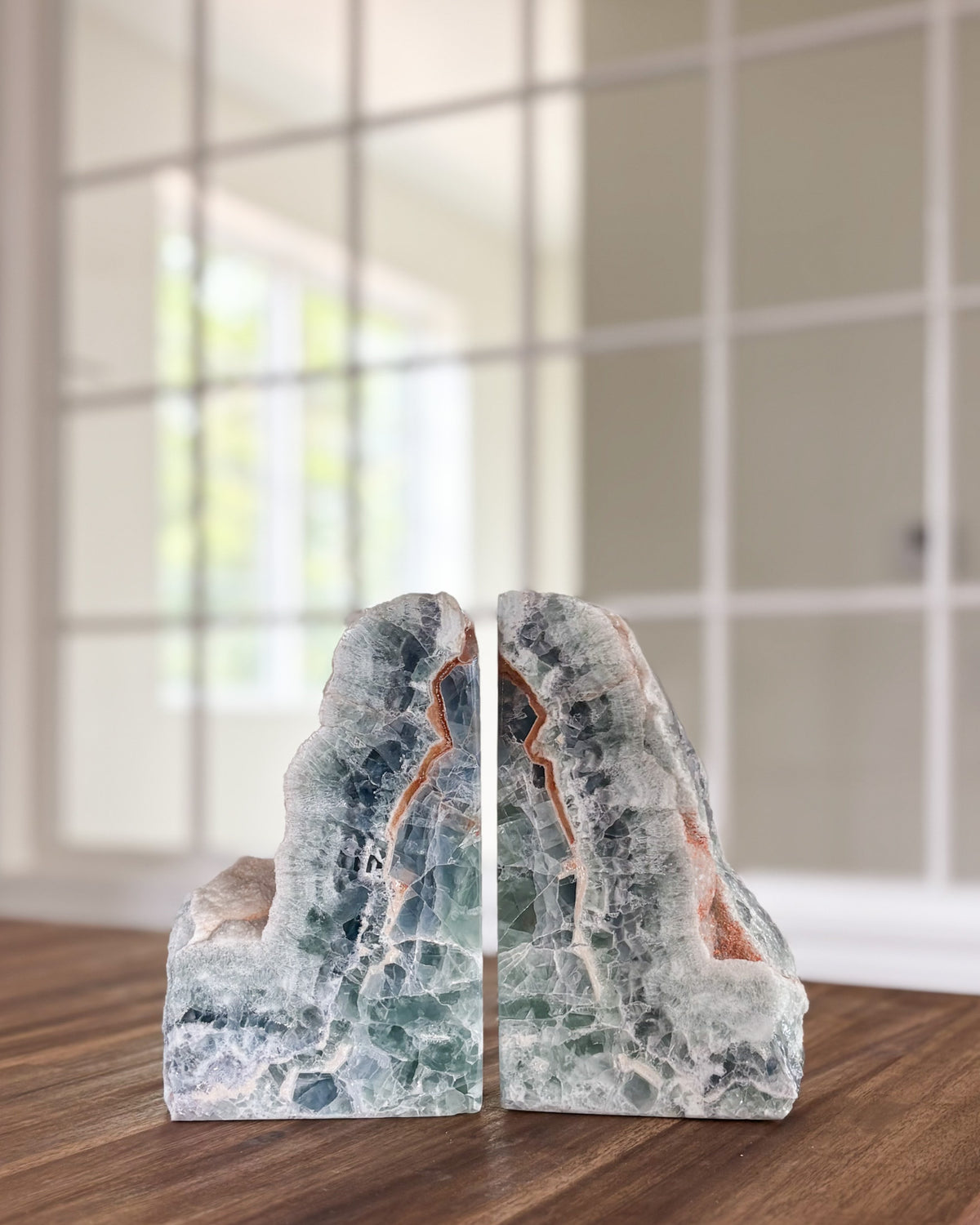 One-of-a-kind fluorite stone bookends with green and purple coloring