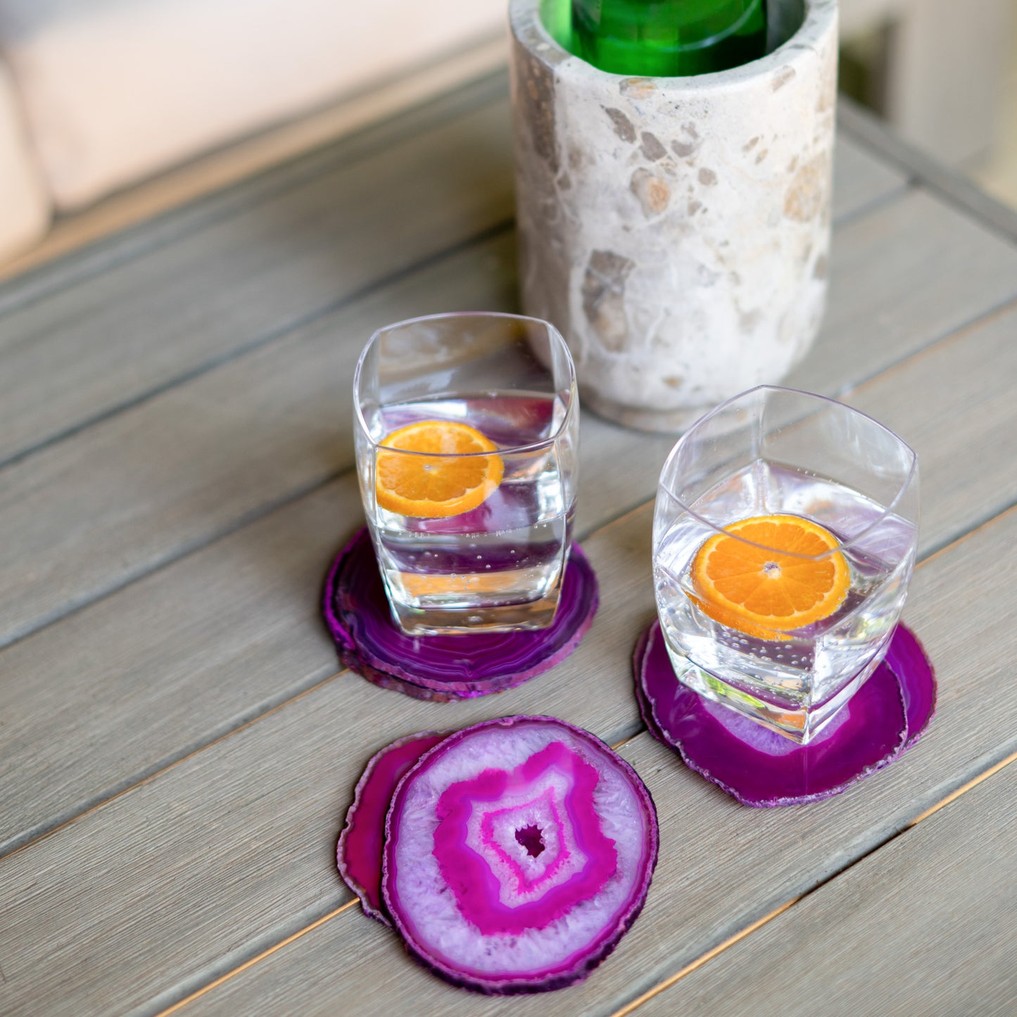Decorative fuchsia agate stone coasters adding bold color and natural elegance to dining and living spaces.