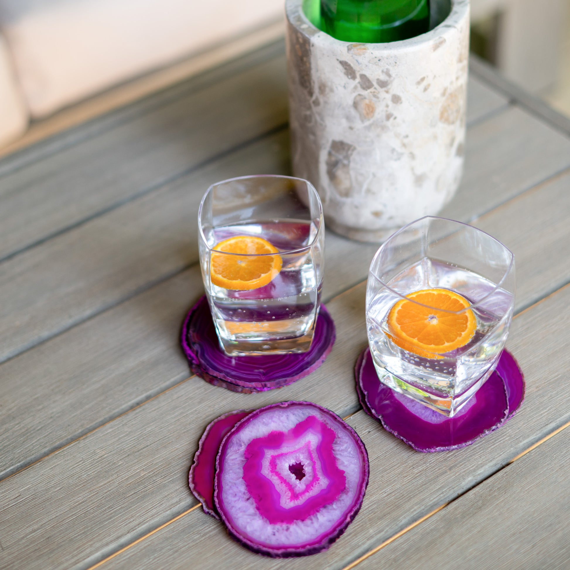 Decorative fuchsia agate stone coasters adding bold color and natural elegance to dining and living spaces.