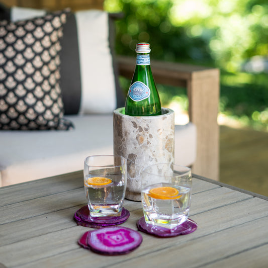 Set of fuchsia agate coasters featuring vibrant natural stone patterns with polished edges for elegant home entertaining.