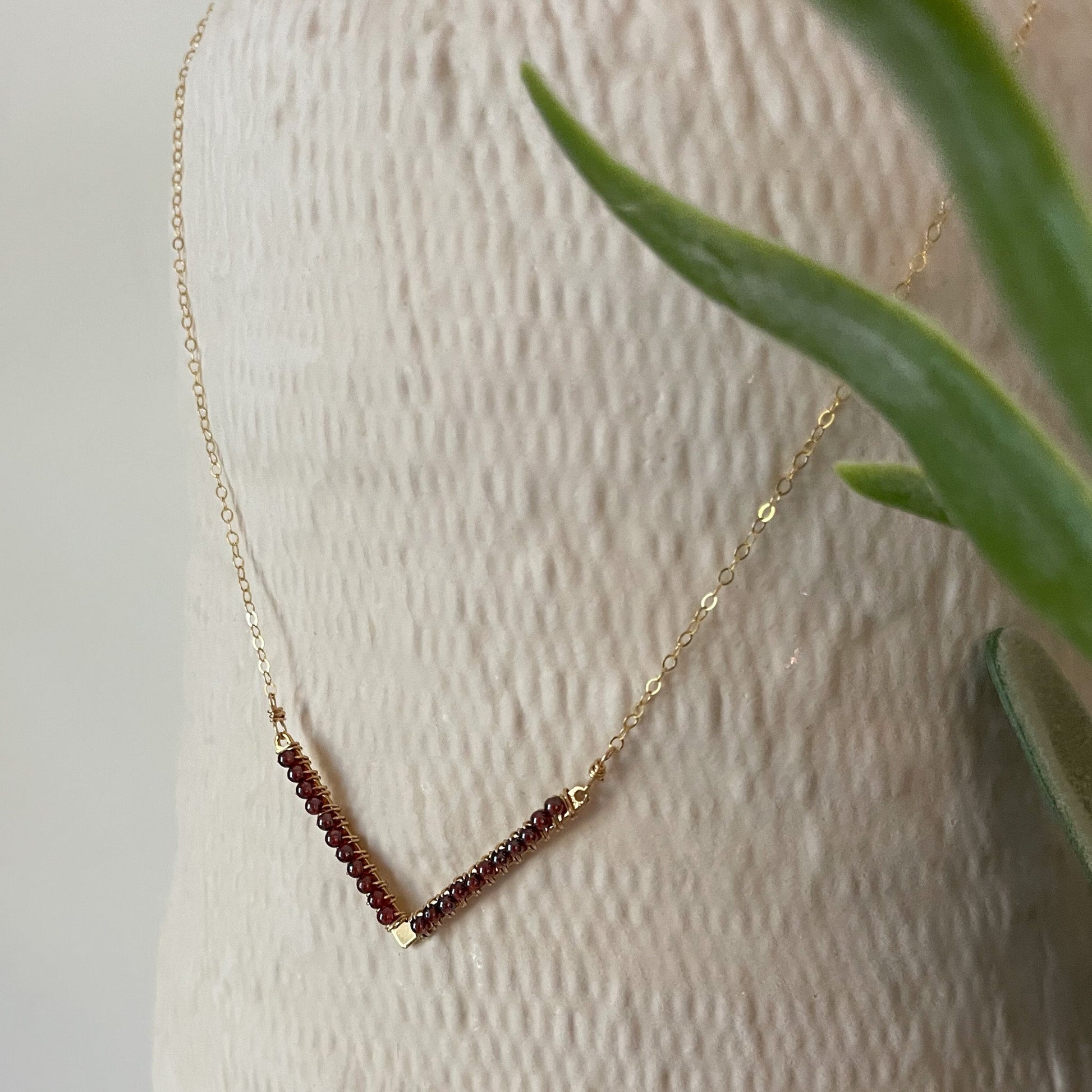 garnet beaded chevron pendant necklace