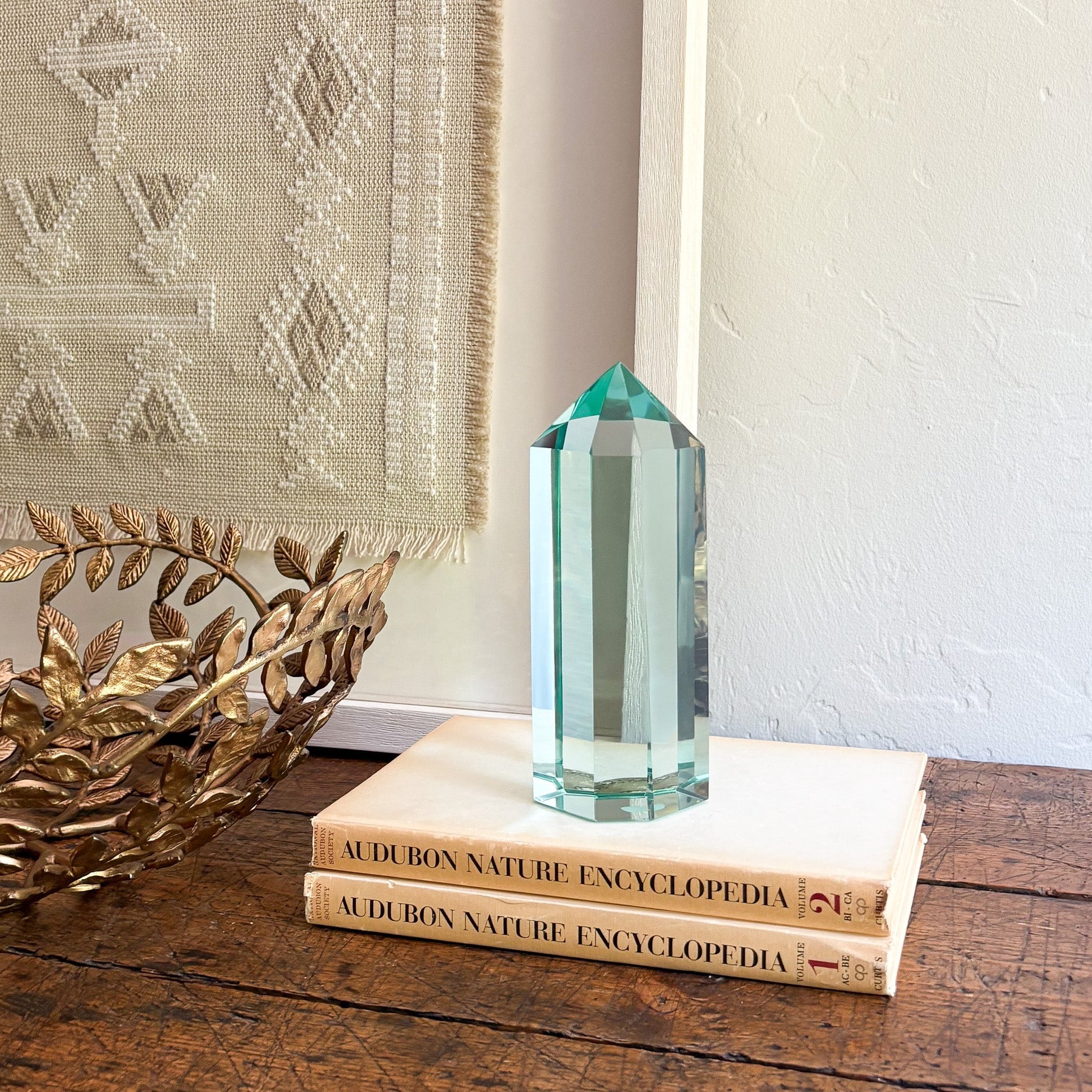 faceted blue green glass point