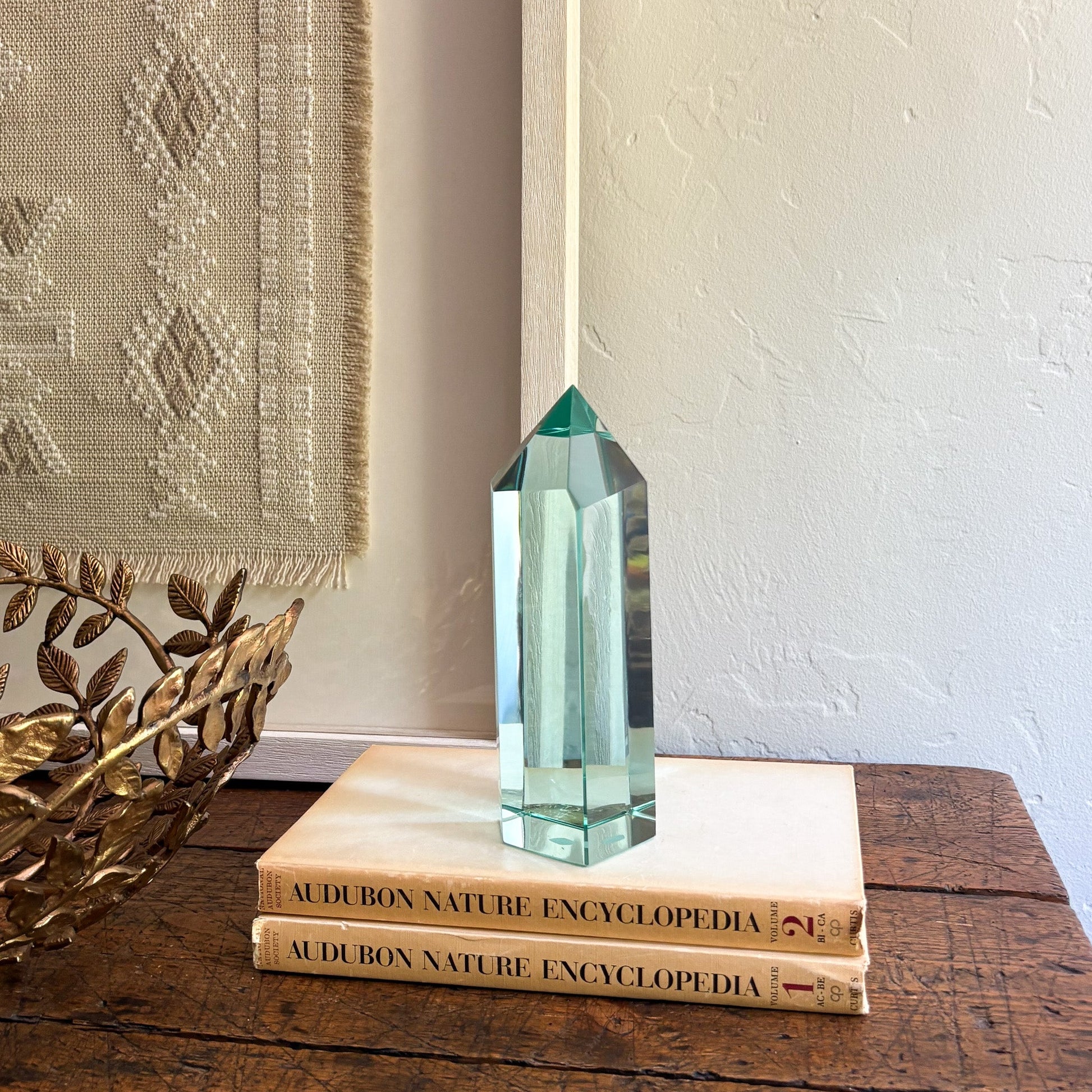 faceted blue green glass point