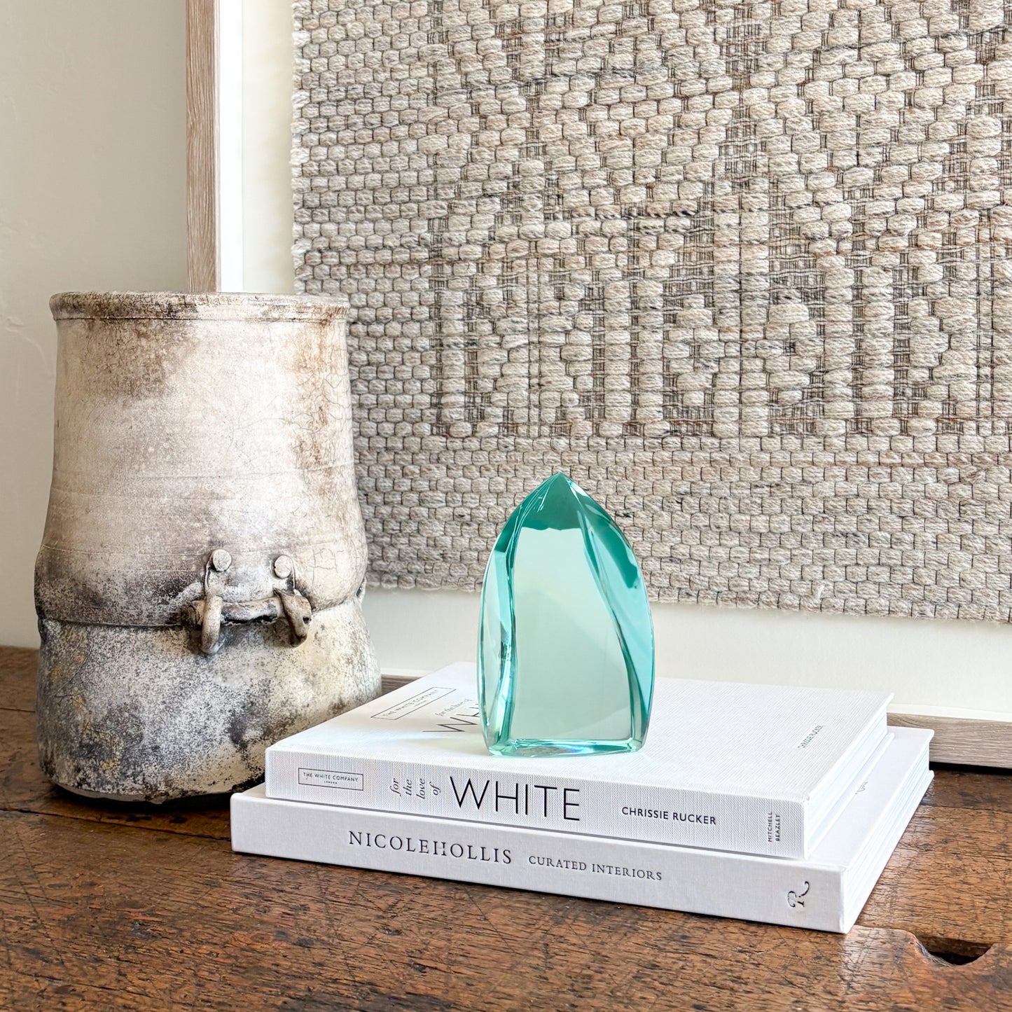 Green glass sculpture with modern abstract curved form