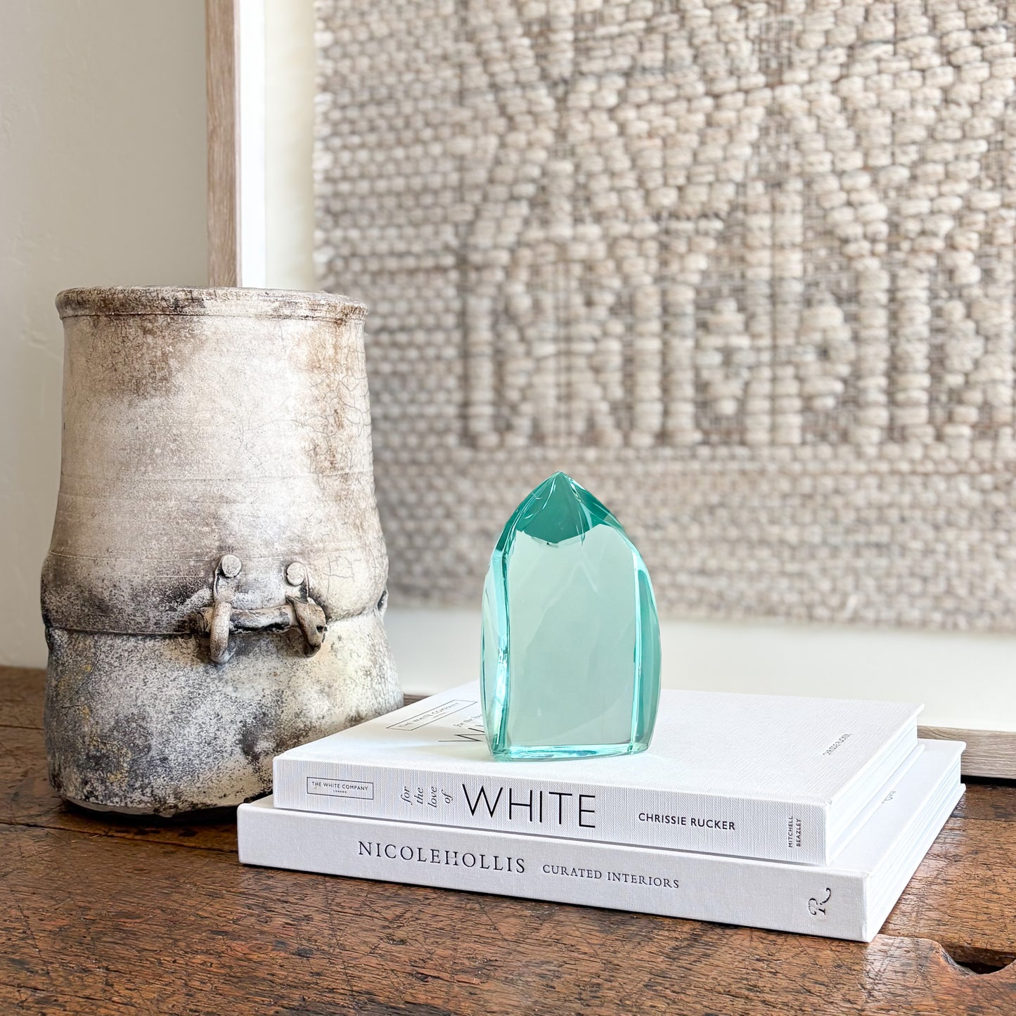 Modern green glass sculpture with polished translucent finish