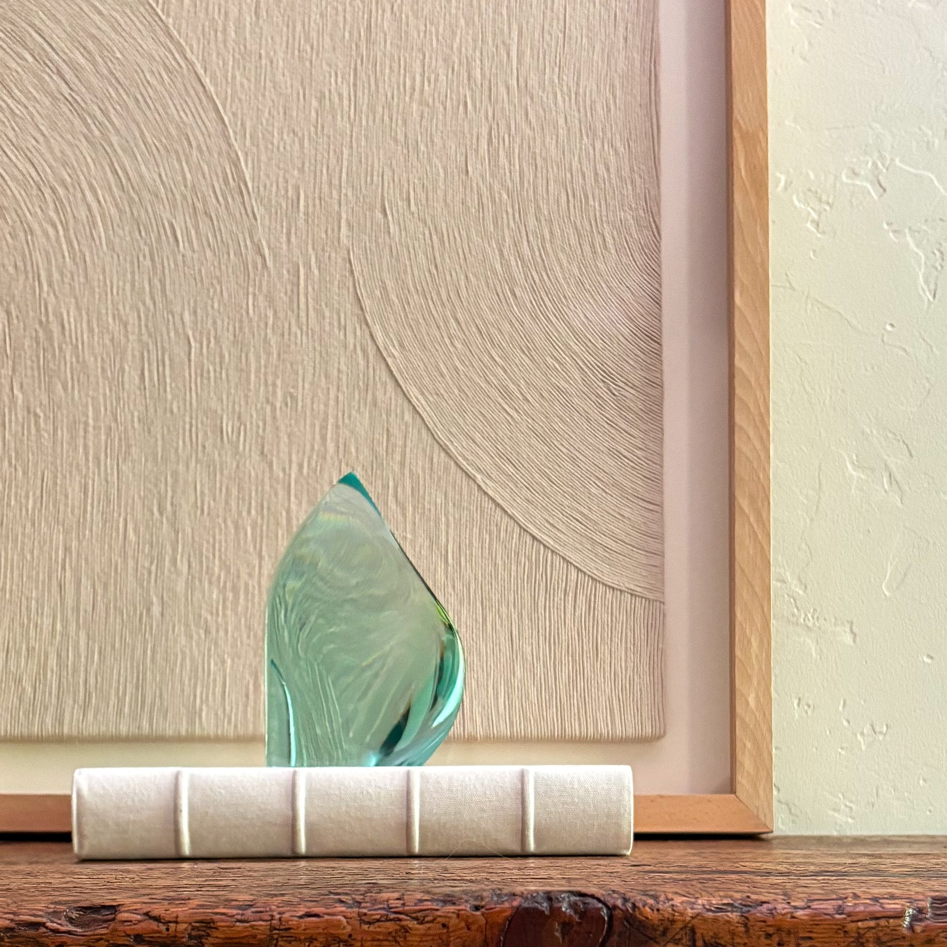 Luxury handcrafted green glass sculpture with modern artistic design