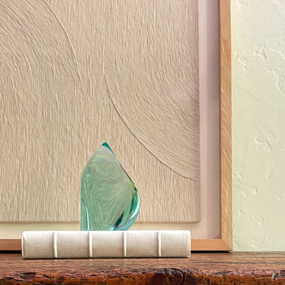 Luxury handcrafted green glass sculpture with modern artistic design