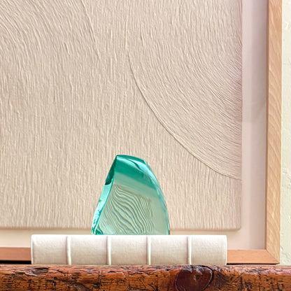 Luxury handcrafted green glass sculpture with modern artistic design