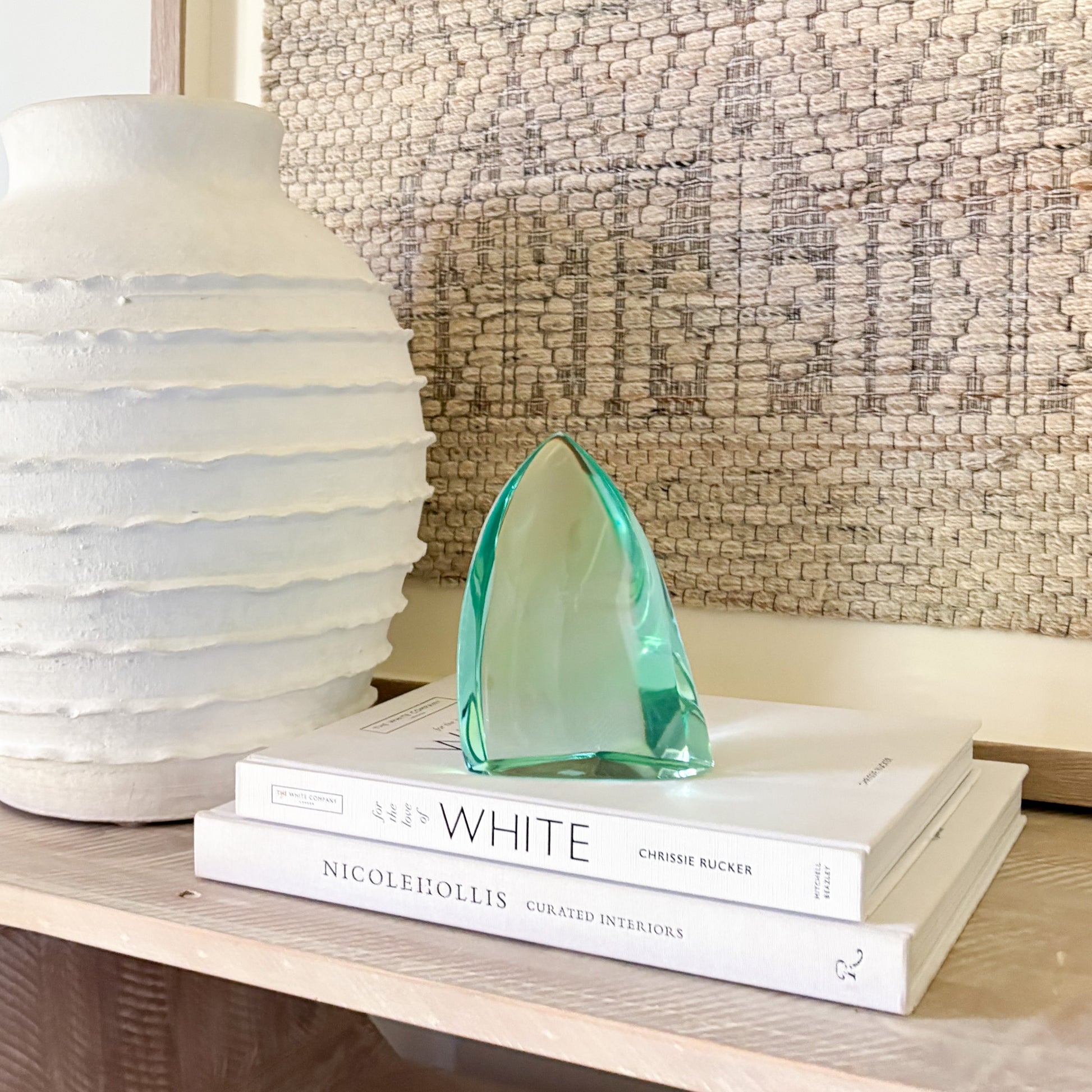 Abstract green glass art piece”