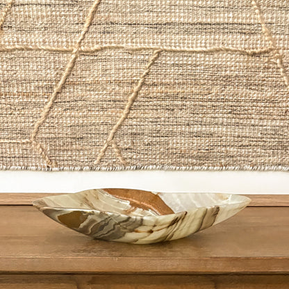 Hand carved green onyx bowl with natural stone veining for luxury home decor