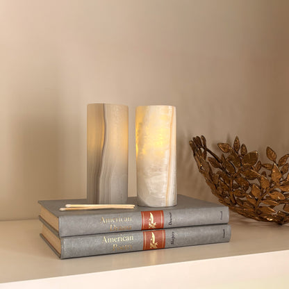 Handcrafted grey aragonite candle holders in artisanal natural stone décor setting