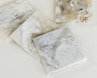 Luxury grey onyx coasters handcrafted from genuine natural stone with unique veining