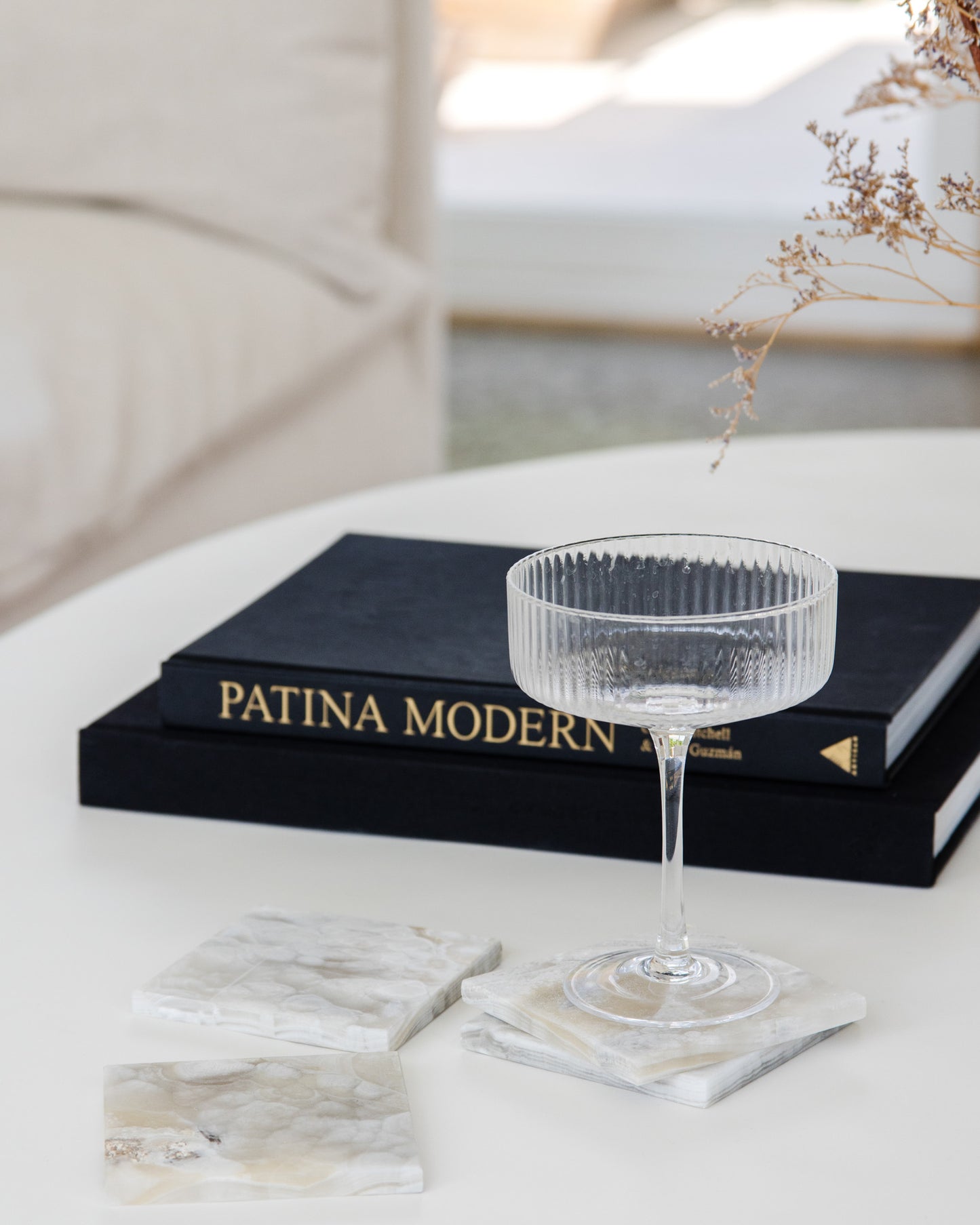 Handcrafted grey onyx coaster set made from natural stone with unique veining for luxury home décor