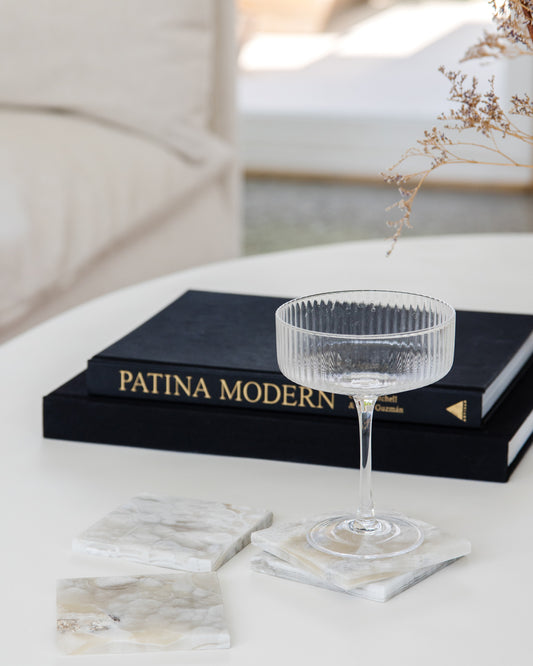 Handcrafted grey onyx coaster set made from natural stone with unique veining for luxury home décor