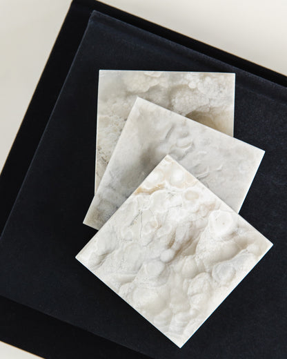 Natural grey onyx coaster set for coffee tables, dining tables, and elegant home entertaining