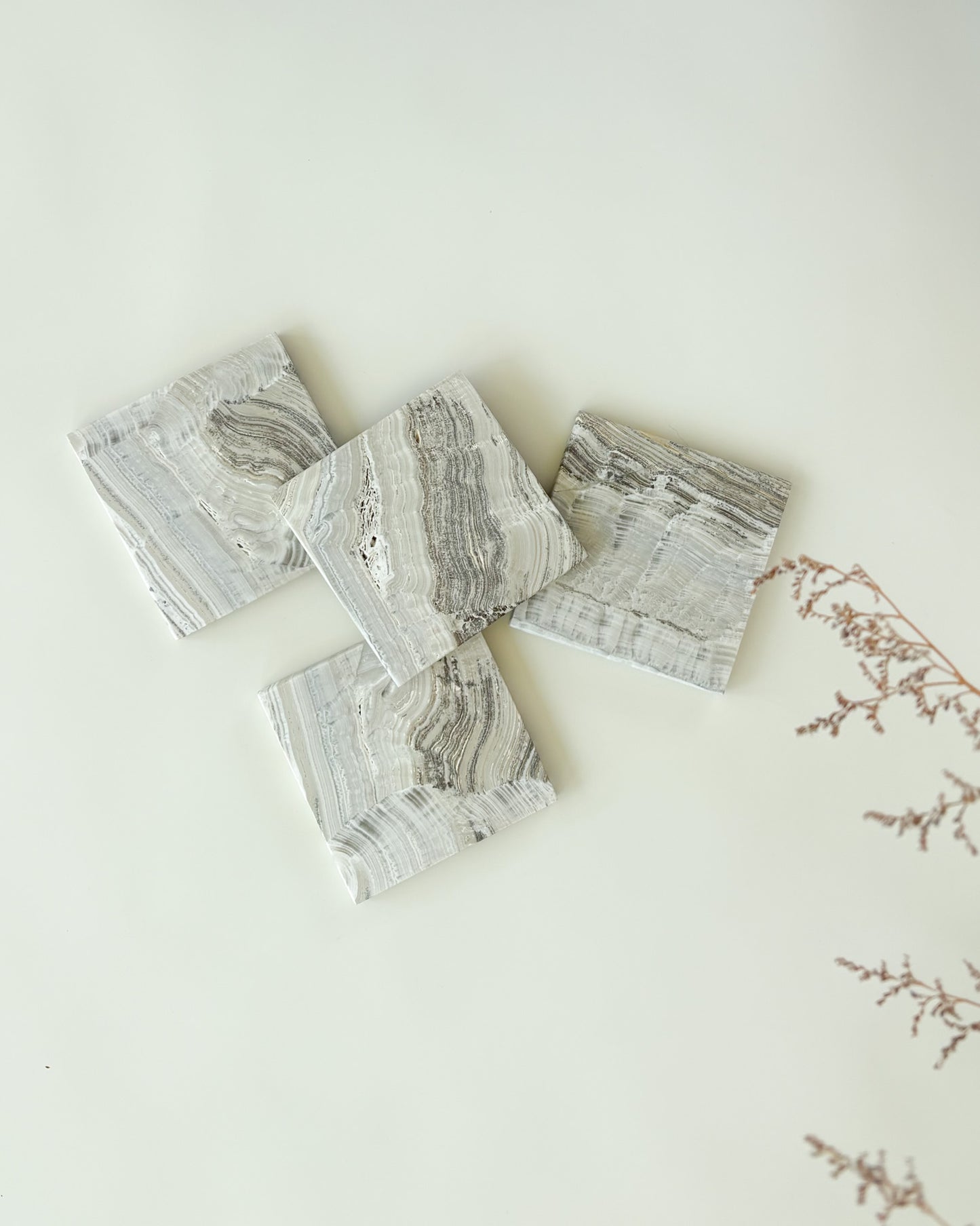 Luxury natural stone coaster set handcrafted from beautiful grey onyx