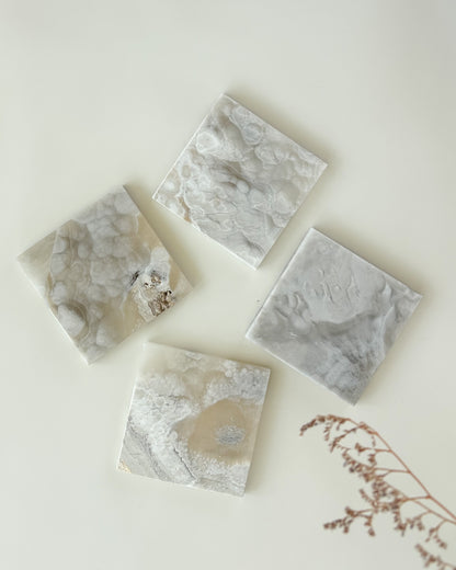 Grey onyx coaster set with rich natural color variation and polished craftsmanship