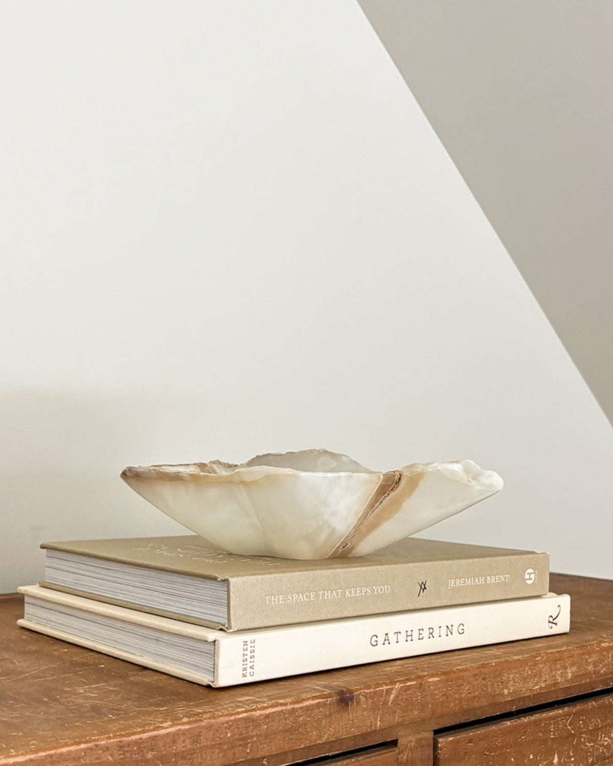 Natural amber onyx bowl with distinctive mineral banding and polished finish