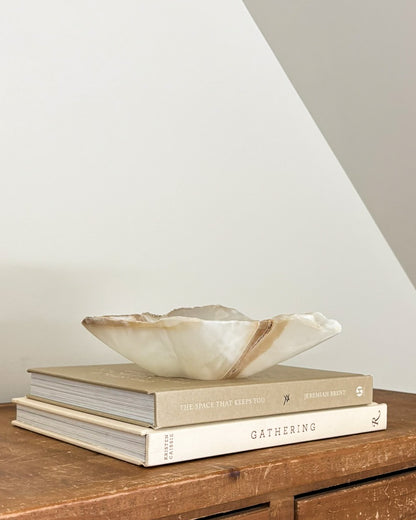 Natural amber onyx bowl with distinctive mineral banding and polished finish