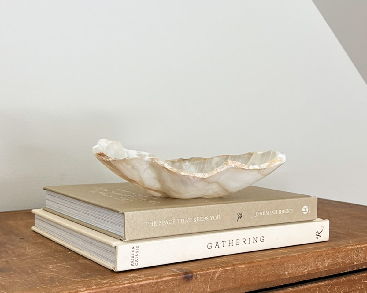 One-of-a-kind amber onyx decorative bowl featuring rich honey-colored banding